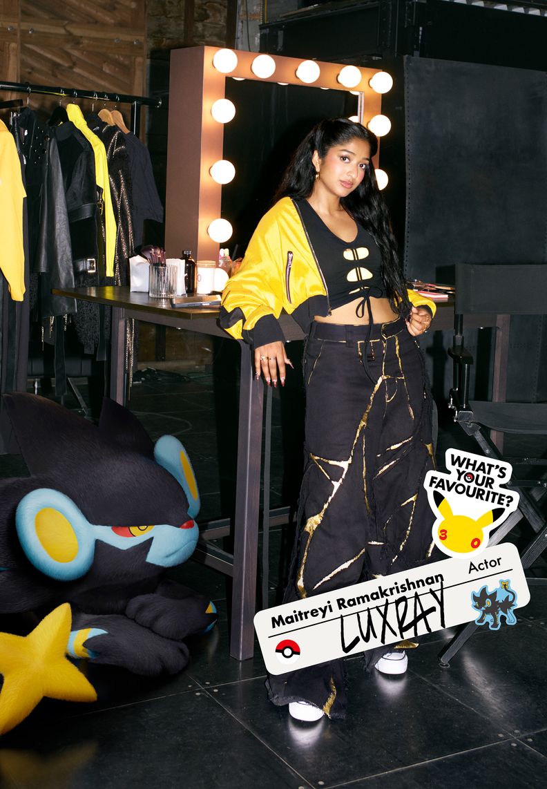 Actor Maitreyi Ramakrishnan poses in a dressing room with Luxray.